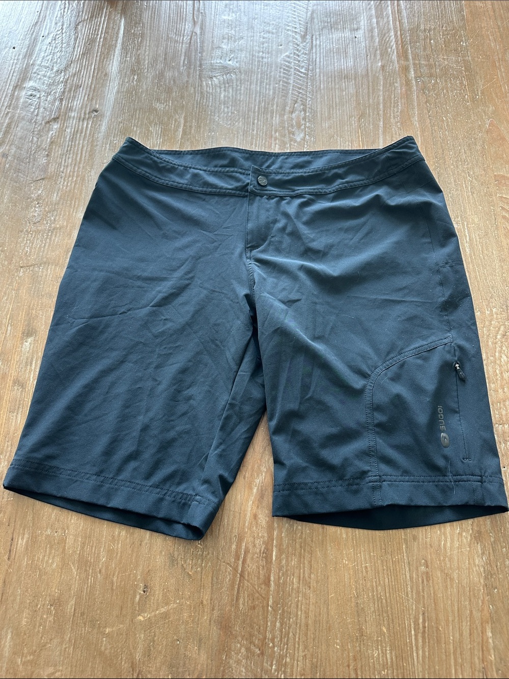 SUGOI Black Women’s Athletic Shorts with Subtle Logo